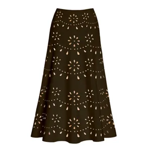 Close-up of elegant hollow-out floral pattern on a dark brown long beach cover-up skirt.