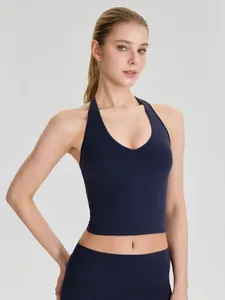 Débardeur de yoga licou bleu marine avec coussinets pour fitness et pilates femme