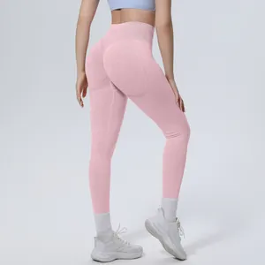 Detailed back view of high-waisted pink seamless yoga leggings with a butt-lifting effect.
