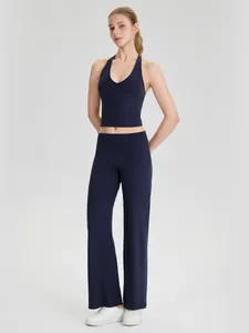 Ensemble débardeur de yoga licou bleu marine et pantalon large pour fitness femme