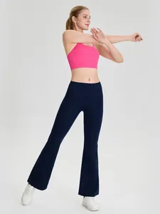 Pink cloud-feel breathable yoga sports bra paired with high-waisted navy flare leggings