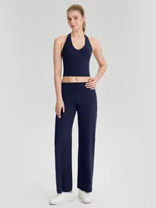 Marineblauw yoga-set met haltertop en wijde rechte sportbroek voor damesfitness