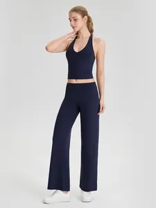 Professionele dames yoga pilates set marineblauw met haltertop en broek met wijde pijpen