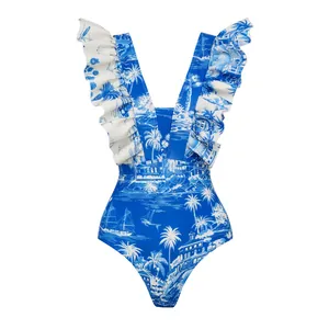 Detail view of blue tropical palm tree print one-piece swimsuit with ruffle shoulders