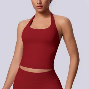 Close-up of a seamless halter-neck sports tank top in deep red for fitness and yoga