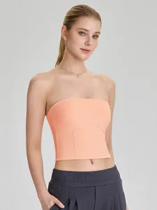 Soutien-gorge de sport bustier sans bretelles couleur pêche pour le yoga et fitness