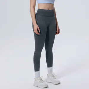 Close-up detail of high-waist seamless washed yoga leggings with breathable fabric texture