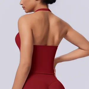 Back view of a deep red seamless halter neck sports vest for yoga fitness training
