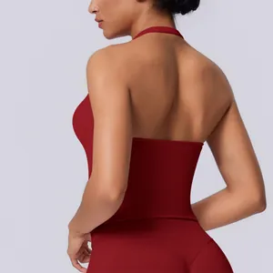 Back view of a red halter neck seamless sports tank top for women, yoga and fitness