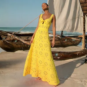 Elegant bright yellow hollow-out maxi beach cover-up dress for summer resort fashion