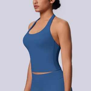 Detail view of a seamless blue halter neck sports tank top for yoga and fitness training