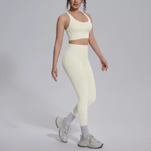 Detailed side profile view of a cream-colored nylon yoga set featuring a sports bra and leggings