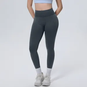 Close-up of high-waisted seamless washed yoga leggings showing texture and fit