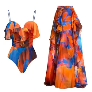 Élégant ensemble maillot de bain à volants et jupe longue imprimé orange et bleu