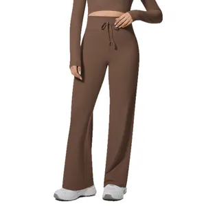 Braune elastische Yoga-Hose mit hoher Taille und passendem langärmeligem Crop-Top