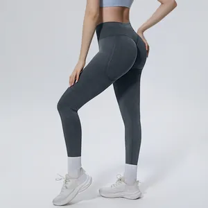 Back view of high-waisted gray seamless yoga pants with butt-lifting detail