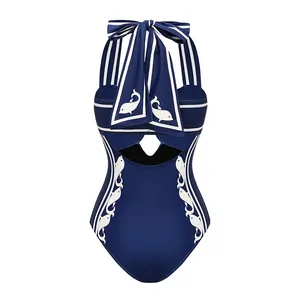 Maillot de bain une pièce licou bleu marine avec motif de dauphin blanc élégant