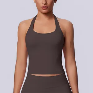 Close-up of a seamless dark brown halter-neck sports top for fitness and yoga.