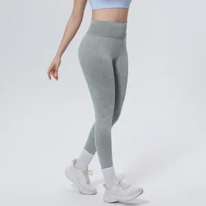 Detailed view of high-waist acid wash seamless yoga leggings showing texture and fit