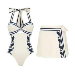 Maillot de bain une pièce licou style marine avec jupe portefeuille et motifs poissons