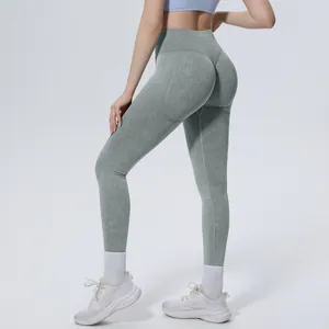Detailed view of gray seamless washed high-waisted yoga leggings with hip-lifting effect.