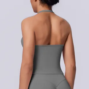Close-up back detail of a seamless halter neck sports vest in solid grey yoga wear