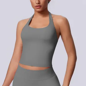 Detail shot of a grey halter neck seamless sports tank top with a tight fit for yoga.