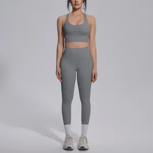 Full front view of grey two-piece seamless yoga set for women's fitness training