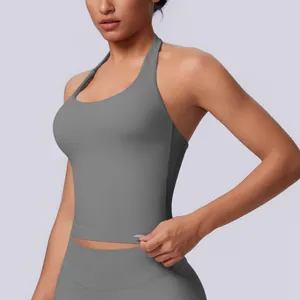 Detailed view of seamless gray halter neck sports tank top with a tight supportive fit