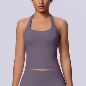Detailed view of seamless purple halter neck sports top showing texture and cut.