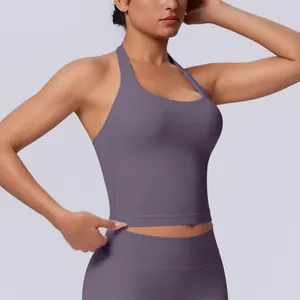 Seamless purple halter neck sports top for women, perfect for yoga and fitness training.