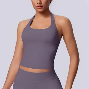 Purple seamless halter neck sports bra for yoga and fitness with a sleek open back design