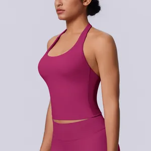 Detailed side view of a magenta seamless halter neck sports bra for yoga and fitness