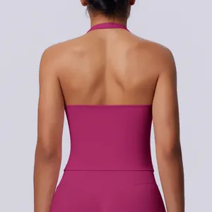 Back view of a magenta seamless halter sports top featuring an elegant backless design for yoga