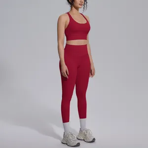 Complete view of women's burgundy high-waist leggings and sports bra yoga set