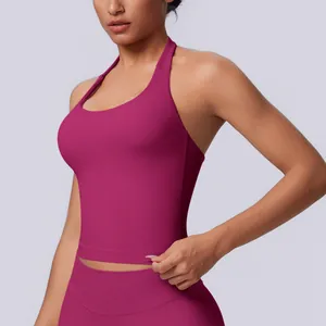 Detailed side view of a magenta seamless halter neck sports tank top for yoga fitness