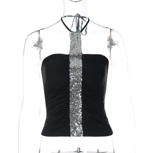 Close-up of black halter bandeau top with central silver sequin panel and pleated detail.
