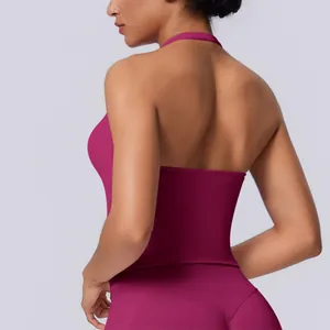 Detailed back view of a magenta seamless halter neck sports top for yoga and fitness