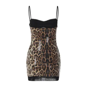 Detailed view of the sexy leopard print sequin mini dress with mesh hem and straps