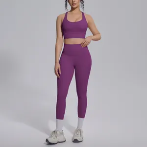 Front view of a purple yoga set featuring high-waist leggings and a matching sports bra
