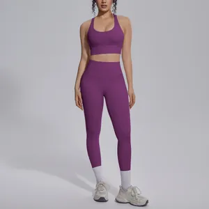 Full-length view of a purple high-waist yoga set with sports bra and leggings.