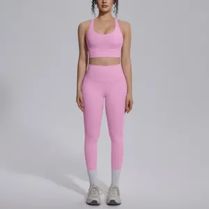 Full-body view of a pink high-waisted naked-feel yoga set on model for fitness and gym