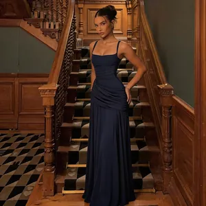 Full view of an elegant navy blue sleeveless evening gown featuring a pleated waist design.