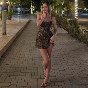 Sexy leopard print V-neck slip mini dress with backless design for night parties.
