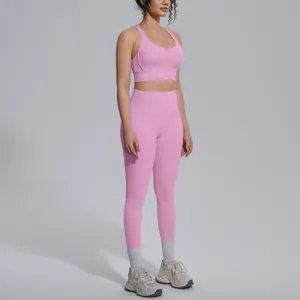 Side view of pink yoga set with high-waisted leggings and matching sports bra
