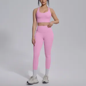 Full view of pink athletic yoga set showing fit and silhouette on model