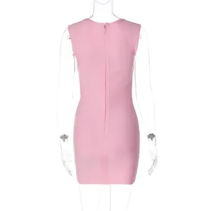 Back view of a chic pink sleeveless bodycon bandage dress with hidden zipper detail