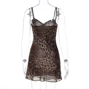 Back view of a sexy leopard print chiffon mini dress with spaghetti straps and ruffle hem