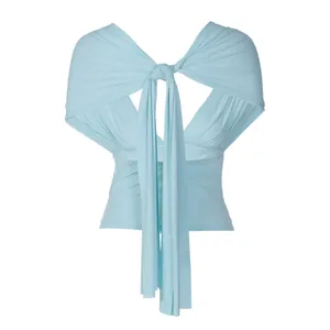 Front view of baby blue wrap top with deep V-neck and elegant shawl draping detail