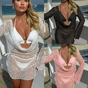 Close-up of cowl neck long sleeve sequin mesh cover-up with matching bikini set